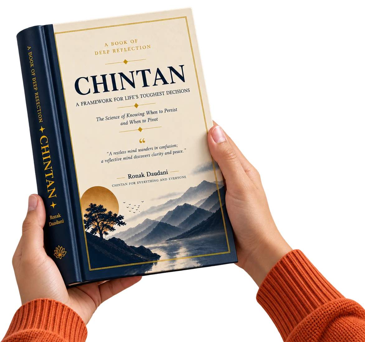 Two hands holding the CHINTAN book, ready to read